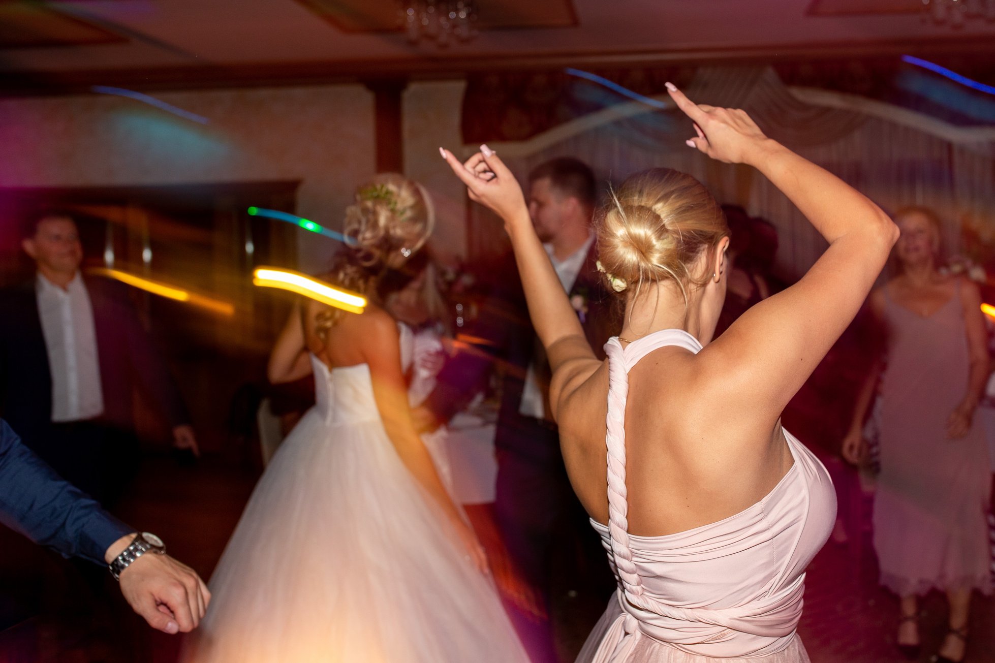 Wedding party. Guests and bridesmaids having fun and dancing on wedding banquet